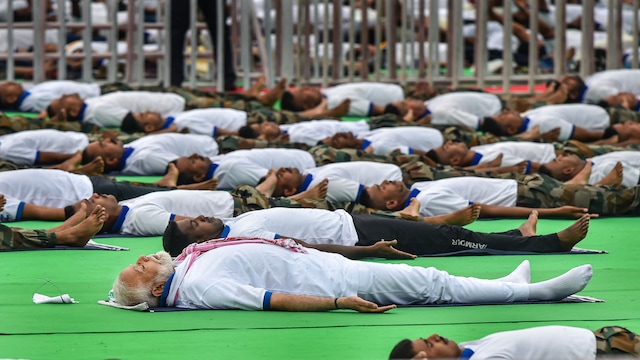 Shavasana | Shavasana, translating to "corpse pose" in English, is an accessible pose for beginners. Lie flat on your back on a smooth surface, resting your arms near your torso. Keep your eyes closed and position your legs comfortably. Shavasana | Shavasana, translating to "corpse pose" in English, is an accessible pose for beginners. Lie flat on your back on a smooth surface, resting your arms near your torso. Keep your eyes closed and position your legs comfortably.
