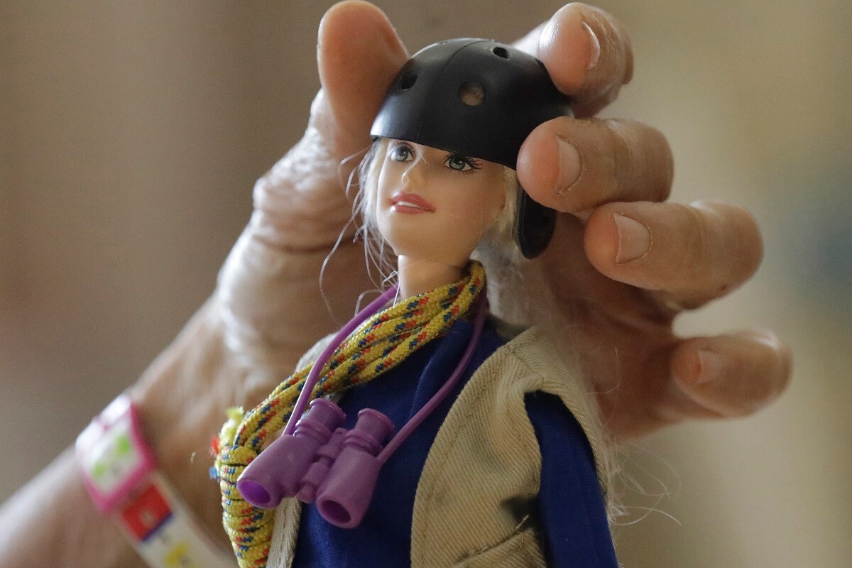 This Dec. 3, 2019, photo taken on the University of Utah campus in Salt Lake City shows one of the "treetop Barbies" ecologist Nalini Nadkarni created outfitted with miniature versions of her own gear. Fifteen years after she began making the dolls, Mattel asked her to consult on a new line of Barbies with careers in science and conservation. (AP Photo/Rick Bowmer)