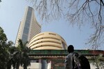 Markets at close: Sensex, Nifty end flat after hitting record highs