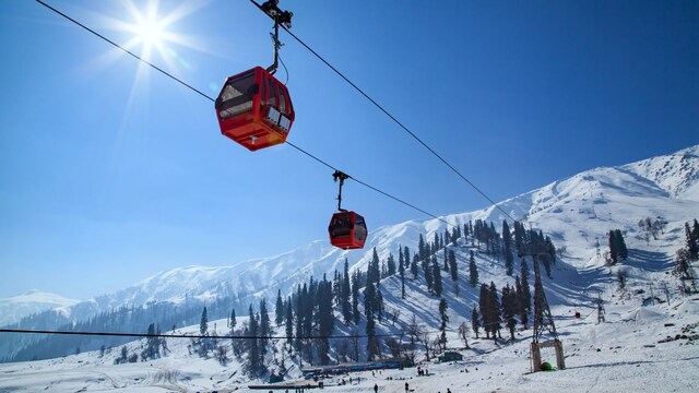 No 5. Gulmarg |  When to travel: December - January | Best time to Book: October - November | Gulmarg means the 'meadow of flowers'. Located around 60 km away from Srinagar, it usually takes an hour and a half by car to reach here. Having the scenic beauty of the Himalayan mountains in its backdrop, this place attracts a large number of tourists every year. A famous attraction here is the Gulmarg Gondola, one of the highest cable cars in the world. It is blessed with lush greenery, colourful flowers and crystal-clear lakes. (image:)