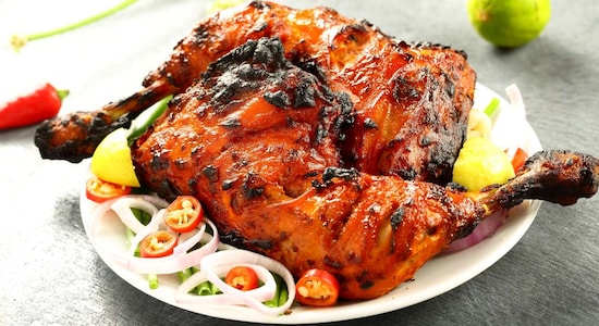 No 9. Tandoori Chicken | A dish made of whole chicken marinated in yogurt and a blend of spices including cayenne pepper, turmeric, then cooked in a tandoor (clay oven), results in tender, smoky chicken with a vibrant red hue and flavours that make it a favorite appetizer or main dish.