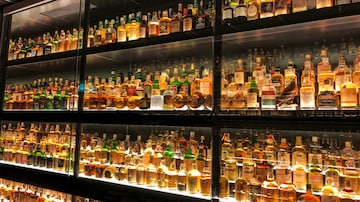 Whether it's scotch from Scotland, bourbon from America, single malts and blended whiskies from Indian distillers, or the smoky allure of Irish whiskey, on World Whiskey Day connoisseurs can explore the nuances of different styles and flavours of whiskies worldwide. On the occasion, the CNBC-TV18 Travel Desk has compiled a list of well-known whiskey brands that are gaining popularity. Take a look.