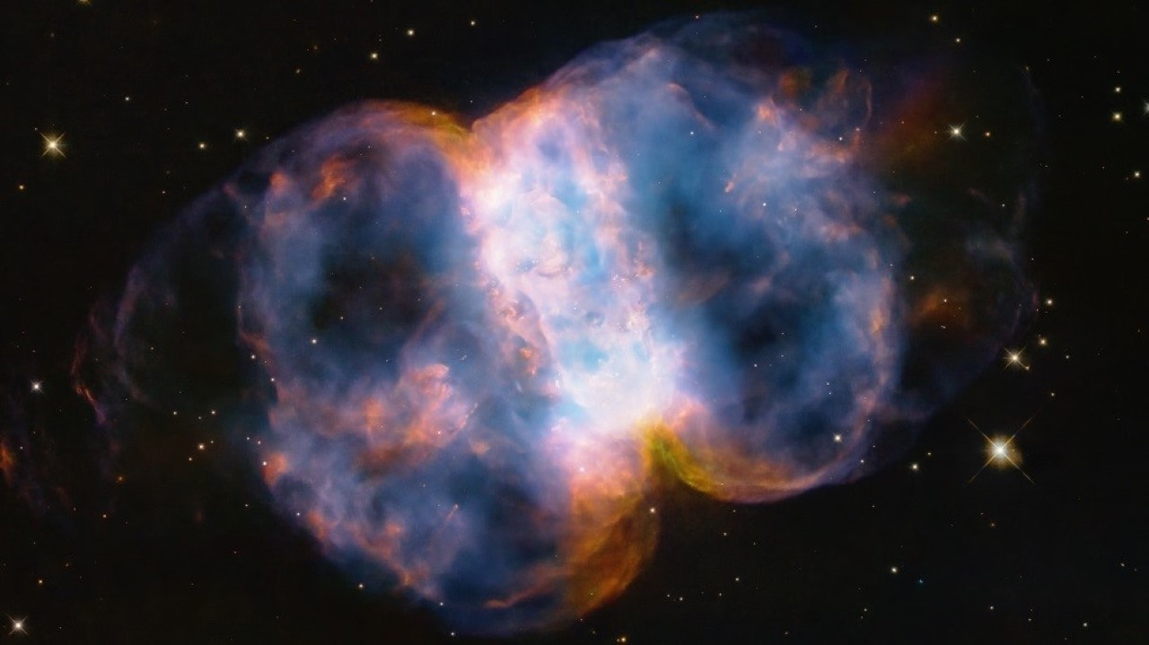 To commemorate the 34th anniversary of NASA's iconic Hubble Space Telescope's launch on April 24, astronomers captured a striking image of the Little Dumbbell Nebula, also known as Messier 76 or NGC 650/651, situated 3,400 light-years away in the Perseus constellation. The visually captivating nebula highlights the the telescope's enduring legacy.