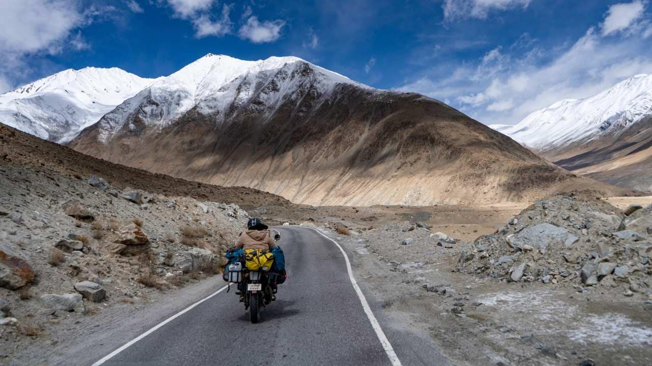 After nearly five months of closure due to heavy snowfall during winter, the 428-kilometer Leh-Manali National Highway has reopened for vehicular traffic by the Border Roads Organisation (BRO), officials announced on April 23. The scenic roadway, serves as an alternate route, linking the Union Territory of Ladakh with the rest of the country through Himachal Pradesh, which was shut in November following the onset of winter. (Image: Shutterstock)