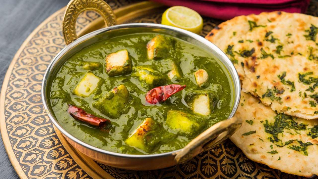 Rank 32. Saag paneer | A vegetarian delight, Saag Paneer showcases the earthy flavors of spinach cooked with aromatic spices and chunks of soft, creamy paneer cheese. (Image: Shutterstock)
