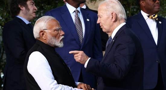 US President Joe Biden speaks with Prime Minister Narendra Modi, asG7 leaders and representatives of States and International Organisations gather for a family photo on the second day of theG7 summit at the Borgo Egnazia resort, in Savelletri, Italy on June 14./Reuters