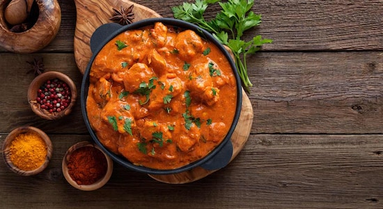 No 5. Butter Chicken | The iconic North Indian dish, features tender chicken marinated in yogurt and spices, simmered in a creamy tomato-based gravy generously mixed with butter and cream, known for its texture and harmonious blend of savoury and mildly sweet flavours. (Image: Shutterstock)