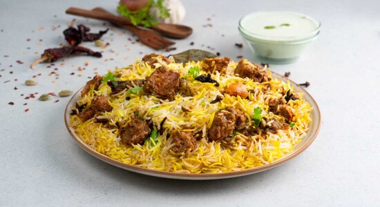 No 6. Hyderabadi Biryani | Making a comeback on the list is the fragrant rice dish from Hyderabad that includes layers of basmati rice and marinated meat (often goat or chicken) with aromatic spices, saffron, and caramelized onions, resulting in a rich and flavorful one-pot meal that's both spicy and subtly sweet.