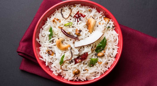 No 3. Thengai Sadam | Thengai Sadam, or coconut rice, can sometimes be a too dry or bland at times, lacking the depth of flavours that other South Indian rice dishes are known for. Its simplicity can at times mean lack of flavour and taste. (Image: Shutterstock)