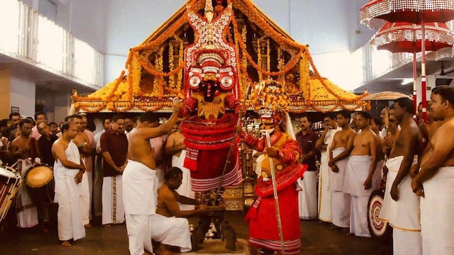 Who performs rituals at the temple? The 'Madayan' while performing special rituals at the temple, places bronze sculptures of dogs next to Lord Muthappan to please the deity. Devotees can be seen offering bronze figurines of dogs to the deity to seek his blessings. (Image: Parassini Madappura Sree Muthappan Temple) Who performs rituals at the temple? The 'Madayan' while performing special rituals at the temple, places bronze sculptures of dogs next to Lord Muthappan to please the deity. Devotees can be seen offering bronze figurines of dogs to the deity to seek his blessings. (Image: Parassini Madappura Sree Muthappan Temple)