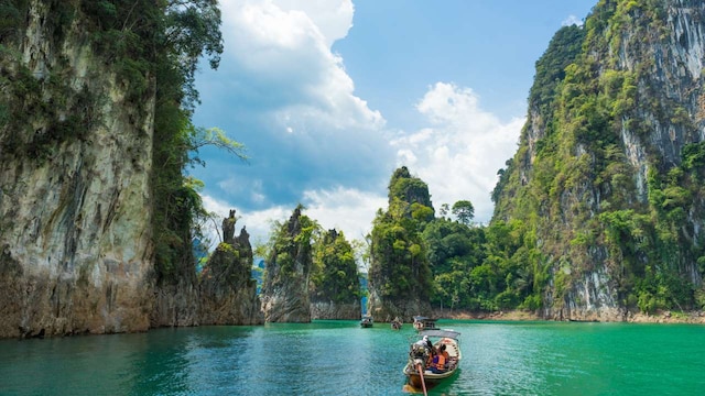 No 8. Khao Lak | Khao Lak boasts long stretches of golden beaches against a backdrop of jungle-clad mountains. It's a gateway to nearby Similan Islands for world-class diving, promising both tranquillity and adventure.