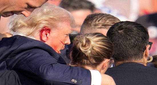 Donald Trump’s campaign says he is “fine” after what law enforcement officials are treating as an apparent assassination attempt during a rally in Butler, Pennsylvania. (AP Photo/Gene J. Puskar)