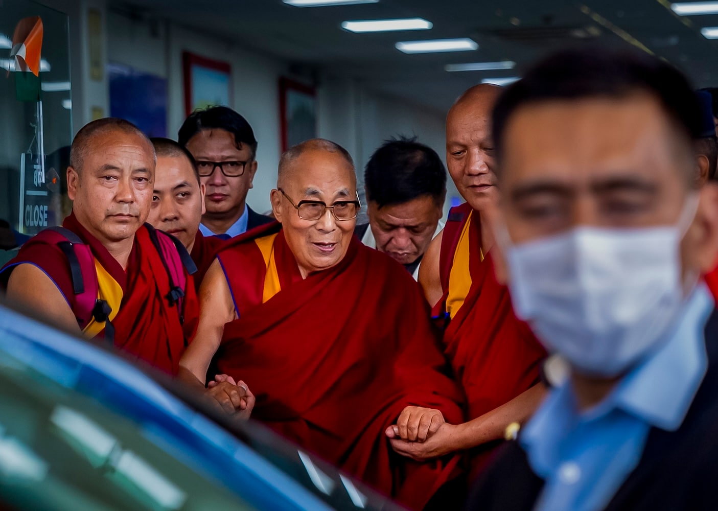 Dalai Lama eases health fears while succession questions take center stage