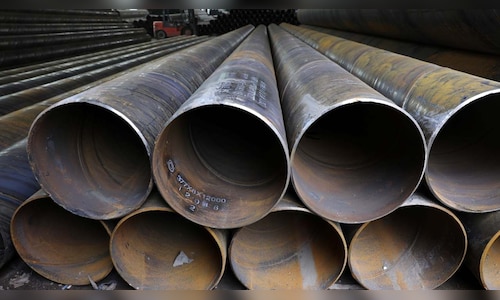 Metals suffer bruising week on strong dollar, China demand woes - CNBC TV18