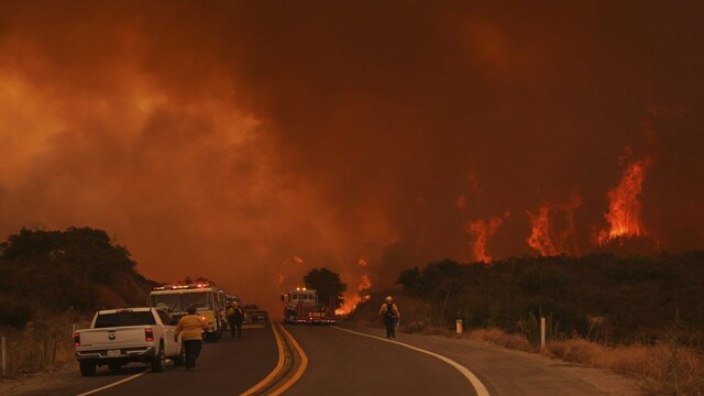 Southern California wildfires force evacuations as flames spread ...