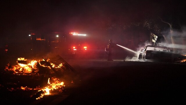 Southern California wildfires force evacuations as flames spread ...
