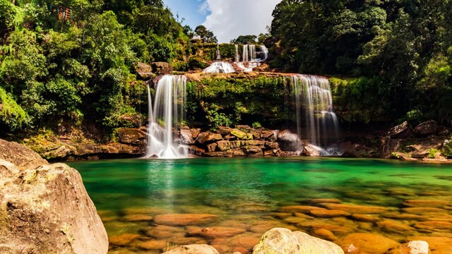 During these months, the waterfalls are captivating, offering perfect spots for swimming and relaxation amid nature. Each waterfall, whether the majestic Seven Sisters or the serene Dainthlen, presents a unique atmosphere that draws visitors in. The refreshing sounds of rushing water and the colourful surroundings create a tranquil yet exhilarating environment. A visit to Meghalaya during these months, promise an escape into nature and a memorable journey through one of India's most enchanting landscapes. Read on to know about 12 such waterfalls that you could go and forget about the world in search of some balm for your soul. The list is in no particular order. (Image: Shutterstock)