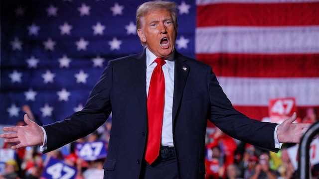 Republican presidential nominee and former U.S. President Donald Trump attends his campaign rally at Macomb Community College in Warren, Michigan, U.S., November 1, 2024. REUTERS/Brian Snyder TPX IMAGES OF THE DAY Republican presidential nominee and former U.S. President Donald Trump attends his campaign rally at Macomb Community College in Warren, Michigan, U.S., November 1, 2024. REUTERS/Brian Snyder TPX IMAGES OF THE DAY
