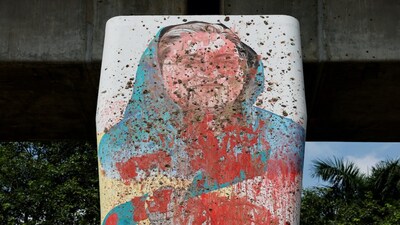 FILE PHOTO: A mural of Bangladeshi Ex Prime Minister Sheikh Hasina is seen vandalised by protesters days before in Dhaka, Bangladesh, August 5, 2024. REUTERS