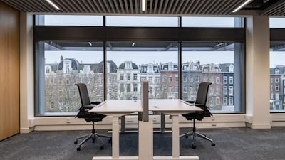 A Workplace of the Future | Inside, the DNB building reflects a commitment to well-being and adaptability. With WELL Platinum certification, it features diverse workstations, ample natural light, greenery, and fresh air on all floors. Art installations inspire creativity, while flexible interiors ensure the space evolves with its users' needs. (Image: De Nederlandsche Bank)