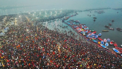 Devotees take a holy dip at Sangam during Maha Kumbh Mela 2025, in Prayagraj, Uttar Pradesh.(PIB Photo)