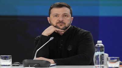 Ukrainian President Volodymyr Zelenskyy listens during a news conference at a security summit in Kyiv, Ukraine, Monday, Feb. 24, 2025. (Frank Gunn/The Canadian Press via AP)
