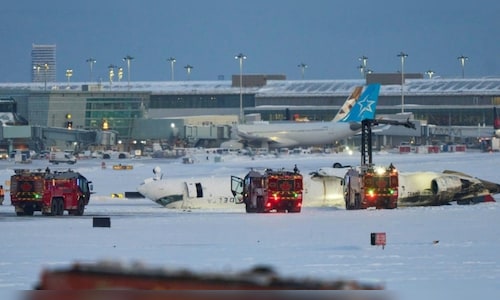 At least 17 injured as Delta plane overturns after landing at Toronto