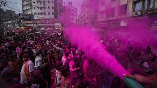 In New Delhi, a rainbow haze hung in the air around a park where the group of friends splashed one another with pigmented powder and colored water. “It’s time for fun and frolic,” said Krisha Bedi, a lawyer, whose face was covered with red, green and blue colors. (Representational Image: AP)