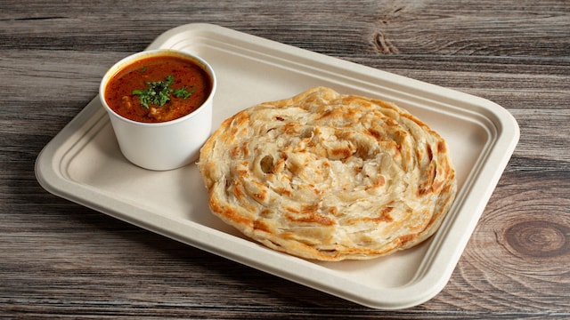 parotta-2025-03-a04b61a264c72c761e3d27b4418c8d09-scaled इन राज्यों में कोशिश करने के लिए सर्वश्रेष्ठ स्ट्रीट फूड्स: भारत का एक पाक दौरा करें