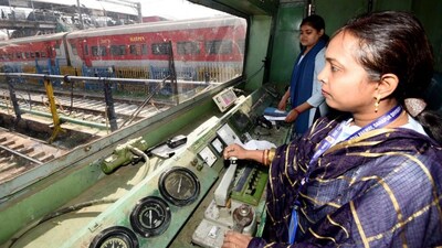 A locomotive pilot Richa Kumari and her assistant Tinki Kumari drive a train on the International Women's Day, in Patna, Saturday, March 8, 2025. (PTI Photo)