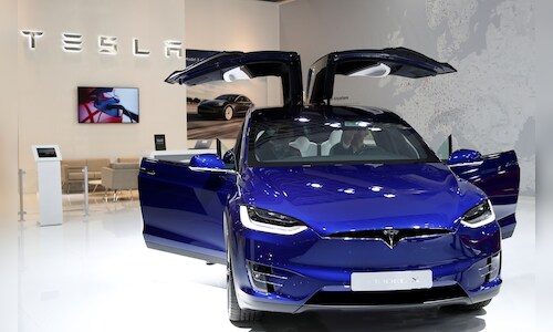 BMW Earnings Plunge; Tesla Sales Slide as China Competition Intensifies