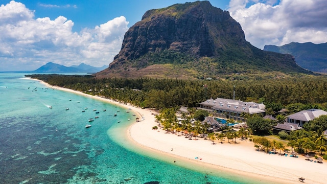 No 11. Mauritius | Visa-free for Indian travellers, Mauritius is ideal for a 5–6 day tropical escape during the monsoon. With direct flights from India, the island offers crystal-clear lagoons, lush hiking trails, luxury beach resorts, and activities like snorkelling, dolphin watching, and cultural tours of Chamarel and Port Louis. Its year-round pleasant weather and romantic vibe make it perfect for couples, honeymooners, and families seeking a relaxed yet enriching holiday. No 11. Mauritius | Visa-free for Indian travellers, Mauritius is ideal for a 5–6 day tropical escape during the monsoon. With direct flights from India, the island offers crystal-clear lagoons, lush hiking trails, luxury beach resorts, and activities like snorkelling, dolphin watching, and cultural tours of Chamarel and Port Louis. Its year-round pleasant weather and romantic vibe make it perfect for couples, honeymooners, and families seeking a relaxed yet enriching holiday.