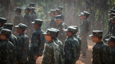 A trainer for the Bamar People's Liberation Army (BPLA) shouts during a training session at a training camp in territory belonging to the Karen National Liberation Army (KNLA), in Karen State, Myanmar, March 6, 2024. A dense bamboo forest in rebel-held territory surrounds the training ground in eastern Myanmar where more than 100 young people, mostly in their twenties, are undergoing rigorous military drills. From former chefs to ex-journalists, rappers and poets, people from all walks of life have joined the resistance movement with a single goal: to overthrow the military regime that seized power in the Southeast Asian nation in 2021. REUTERS/Stringer SEARCH "MYANMAR BPLA ARMY" FOR THIS STORY. SEARCH "WIDER IMAGE" FOR ALL STORIES.