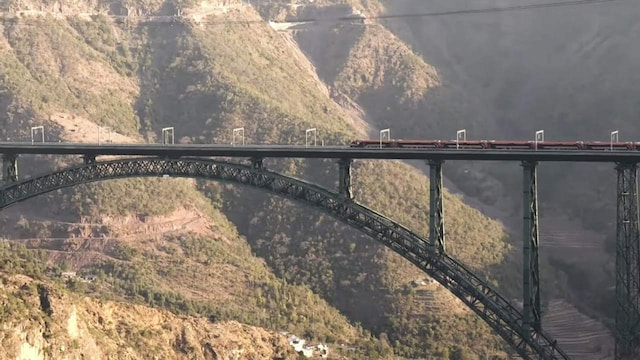 12. A landmark in national infrastructure | The Chenab Rail Bridge is not just a record-setter; it embodies India's modern infrastructure revolution, promoting national cohesion, defense logistics, and economic advancement in Jammu and Kashmir. (Image: PTI) 12. A landmark in national infrastructure | The Chenab Rail Bridge is not just a record-setter; it embodies India's modern infrastructure revolution, promoting national cohesion, defense logistics, and economic advancement in Jammu and Kashmir. (Image: PTI)