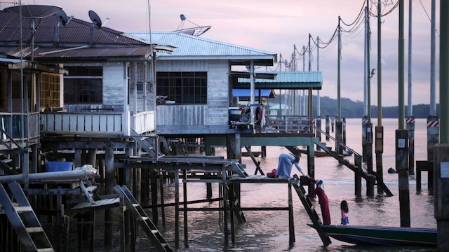 Kampong Ayer, Brunei: Known as Water Village, Kampong Ayer is a historic settlement that runs along the Brunei River, home to nearly 30,000 residents who conduct their lives in stilted houses, schools, and mosques elevated above the water. This community has more than a thousand years of history and continues to exemplify water-based urban living in Southeast Asia. Kampong Ayer, Brunei: Known as Water Village, Kampong Ayer is a historic settlement that runs along the Brunei River, home to nearly 30,000 residents who conduct their lives in stilted houses, schools, and mosques elevated above the water. This community has more than a thousand years of history and continues to exemplify water-based urban living in Southeast Asia.