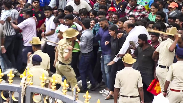 Authorities deployed mild force to manage the crowd and stabilize the situation prior to a formal recognition for the Royal Challengers Bangalore (RCB) team organized by the Karnataka State Cricket Association (KSCA). Authorities deployed mild force to manage the crowd and stabilize the situation prior to a formal recognition for the Royal Challengers Bangalore (RCB) team organized by the Karnataka State Cricket Association (KSCA).