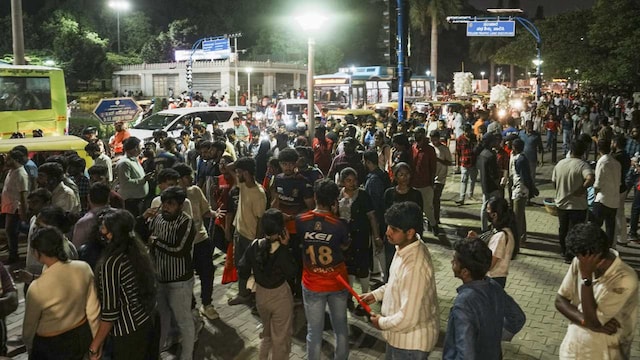 The stampede occurred as numerous fans tried to enter the stadium at various gates. Police faced challenges managing the crowd, resulting in chaos and transforming a celebratory event into a tragedy. (Image: PTI) The stampede occurred as numerous fans tried to enter the stadium at various gates. Police faced challenges managing the crowd, resulting in chaos and transforming a celebratory event into a tragedy. (Image: PTI)