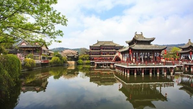 Zhejiang, China: One of the oldest water towns in China, Zhejiang is celebrated for its beautifully preserved ancient structures and stone bridges. The canals of this city meander through historic buildings, allowing for gondola-style boat rides beneath graceful arches. It is a favored day trip spot from Shanghai that enchants visitors with its charm and calmness. Zhejiang, China: One of the oldest water towns in China, Zhejiang is celebrated for its beautifully preserved ancient structures and stone bridges. The canals of this city meander through historic buildings, allowing for gondola-style boat rides beneath graceful arches. It is a favored day trip spot from Shanghai that enchants visitors with its charm and calmness.