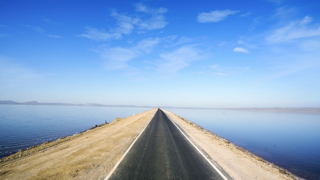 No 2. Ahmedabad to Kutch | Distance: 454 km | This road trip takes you from the urban vibrancy of Ahmedabad to the vast, surreal expanse of the Rann of Kutch. The journey is best timed during the Rann Utsav, when the white salt desert comes alive with music, dance, and craft bazaars. En route, you can explore traditional Gujarati villages known for their textiles and handicrafts. No 2. Ahmedabad to Kutch | Distance: 454 km | This road trip takes you from the urban vibrancy of Ahmedabad to the vast, surreal expanse of the Rann of Kutch. The journey is best timed during the Rann Utsav, when the white salt desert comes alive with music, dance, and craft bazaars. En route, you can explore traditional Gujarati villages known for their textiles and handicrafts.