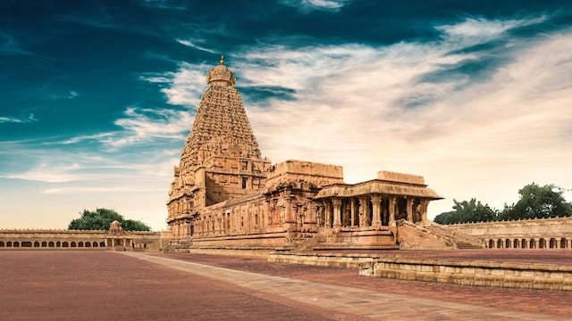 4. Brihadeeswara Temple, Thanjavur | Known for its enormous vimana (tower) and granite architecture, this Chola masterpiece is a UNESCO World Heritage Site from the 11th century. Dedicated to Lord Shiva, the temple displays the magnificence of Tamil dynastic history. Stories from Hindu texts are depicted in the paintings that adorn the temple's dazzlingly beautiful walls. (Image: Canva) 4. Brihadeeswara Temple, Thanjavur | Known for its enormous vimana (tower) and granite architecture, this Chola masterpiece is a UNESCO World Heritage Site from the 11th century. Dedicated to Lord Shiva, the temple displays the magnificence of Tamil dynastic history. Stories from Hindu texts are depicted in the paintings that adorn the temple's dazzlingly beautiful walls. (Image: Canva)