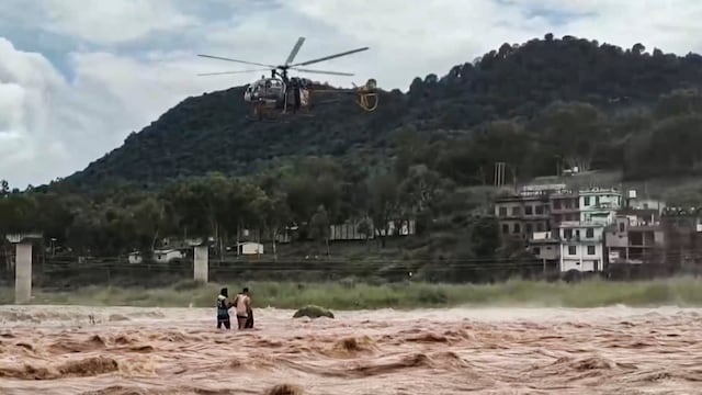 Watch | Army pilots hover chopper 1 foot above river to rescue 9-year ...