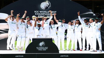 Cricket - 2025 ICC World Test Championship Final - South Africa v Australia - Lord's Cricket Ground, London, Britain - June 14, 2025 South Africa's Temba Bavuma lifts the ICC Test Championship Mace on the podium with teammates after winning the final Action Images via Reuters/Andrew Boyers     TPX IMAGES OF THE DAY