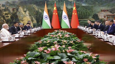 In this photo provided by Indian Prime Minister's Office, Indian Prime Minister Narendra Modi, left, and Chinese President Xi Jinping, right, hold a meeting on the sidelines of the Shanghai Cooperation Organization (SCO) summit in Tianjin, China Sunday, Aug. 31, 2025. (Indian Prime Minister's Office via AP)