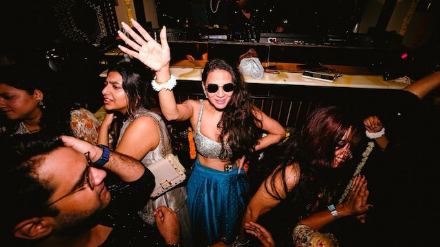 People partying at a fake wedding event