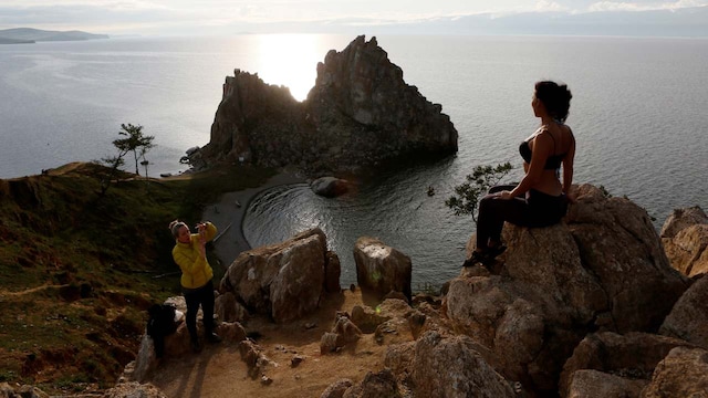 2. Olkhon | Olkhon Island, the largest island on Lake Baikal, is a serene destination known for its mystical landscapes and crystal-clear waters. With its dramatic cliffs, sandy beaches, and sacred shamanic sites, it offers an unforgettable experience for nature lovers. Despite its remote location, it remains a safe haven for travellers seeking peace and natural beauty. 2. Olkhon | Olkhon Island, the largest island on Lake Baikal, is a serene destination known for its mystical landscapes and crystal-clear waters. With its dramatic cliffs, sandy beaches, and sacred shamanic sites, it offers an unforgettable experience for nature lovers. Despite its remote location, it remains a safe haven for travellers seeking peace and natural beauty.