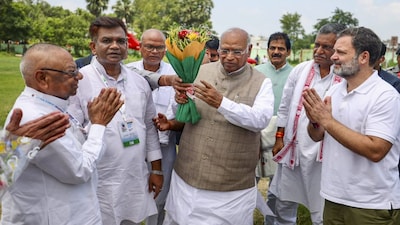 **EDS: THIRD PARTY IMAGE** In this image released by AICC on Aug. 17, 2025, Congress President Mallikarjun Kharge and LoP in Lok Sabha Rahul Gandhi receive a warm welcome from party Bihar president Rajesh Kumar and others ahead of 'Voter Rights Rally', in Sasaram. (AICC via PTI Photo) (PTI08_17_2025_000053B)