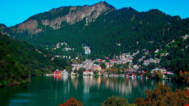 No 3. Nainital | Famous for the Naini Lake, it's perfect for those who want to experience the serene beauty while enjoying boating and lakeside walks. Surrounded by lush green forests, the town's bustling Mall Road markets, picturesque cafes, and scenic viewpoints make the trip worth your time and travel.(Image: Canva) No 3. Nainital | Famous for the Naini Lake, it's perfect for those who want to experience the serene beauty while enjoying boating and lakeside walks. Surrounded by lush green forests, the town's bustling Mall Road markets, picturesque cafes, and scenic viewpoints make the trip worth your time and travel.(Image: Canva)