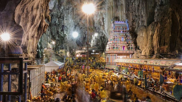 4. Batu Caves, Malaysia | Built beneath a limestone hill close to Kuala Lumpur, Batu Caves is a Hindu temple and one of Malaysia's most popular tourist attractions. The place is guarded by a 140-foot golden statue of Lord Murugan, and visitors ascend 272 rainbow-coloured steps to get to the entrance. 4. Batu Caves, Malaysia | Built beneath a limestone hill close to Kuala Lumpur, Batu Caves is a Hindu temple and one of Malaysia's most popular tourist attractions. The place is guarded by a 140-foot golden statue of Lord Murugan, and visitors ascend 272 rainbow-coloured steps to get to the entrance.