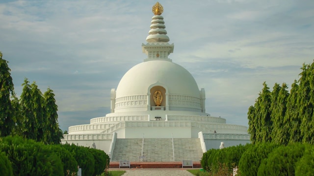 Lumbini, Nepal | Lumbini is home to numerous monasteries and meditation centres and is known as the birthplace of Lord Buddha. The sacred location is marked by the Maya Devi Temple. The complex includes 25 international monasteries, each reflecting unique cultural and architectural styles from several countries including China, Japan, and South Korea. (Image: Shutterstock) Lumbini, Nepal | Lumbini is home to numerous monasteries and meditation centres and is known as the birthplace of Lord Buddha. The sacred location is marked by the Maya Devi Temple. The complex includes 25 international monasteries, each reflecting unique cultural and architectural styles from several countries including China, Japan, and South Korea. (Image: Shutterstock)