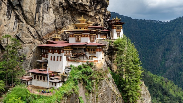 Paro Taktsang (Tiger’s Nest), Bhutan | Situated on the cliffside of the upper Paro valley in Bhutan, Paro Taktsang is a renowned Vajrayana Himalayan Buddhist site. This monastery is a gem of Himalayan spirituality, and the journey to its entrance is as transforming as the destination. (Image: Wikimedia Commons) Paro Taktsang (Tiger’s Nest), Bhutan | Situated on the cliffside of the upper Paro valley in Bhutan, Paro Taktsang is a renowned Vajrayana Himalayan Buddhist site. This monastery is a gem of Himalayan spirituality, and the journey to its entrance is as transforming as the destination. (Image: Wikimedia Commons)
